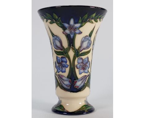 Moorcroft vase decorated with blue flowers: Two star collectors club piece, Signed by S Hayes and dated 21/6/2001. Height 15.