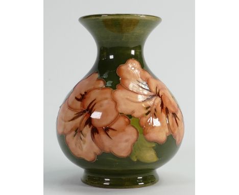 Walter Moorcroft vase decorated in the Hibiscus design: With paper label, height 13.5cm.