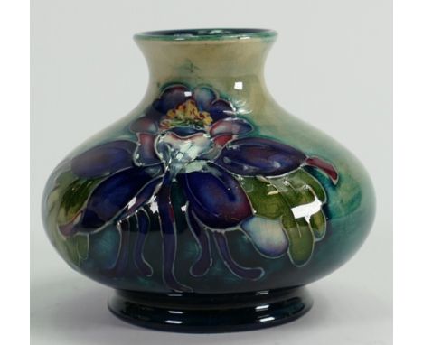 Walter Moorcroft small vase decorated all around in the Columbine design: Height 7.5cm.