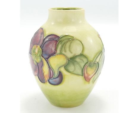 Moorcroft Clematis vase: Firing crack to base, height 9cm, boxed.