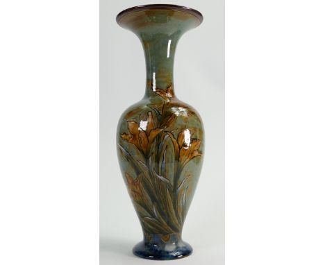 Royal Doulton Lambeth Stoneware vase decorated with Lillies: Artist signed, height 34cm.