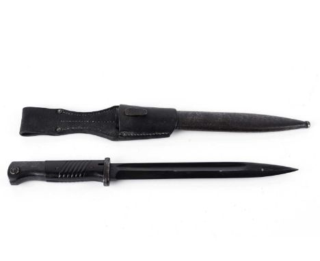 A German K98 bayonet, by Berg &amp; Co, 1940, with matching scabbard, blade and scabbard stamped '8256', with leather frog, 4