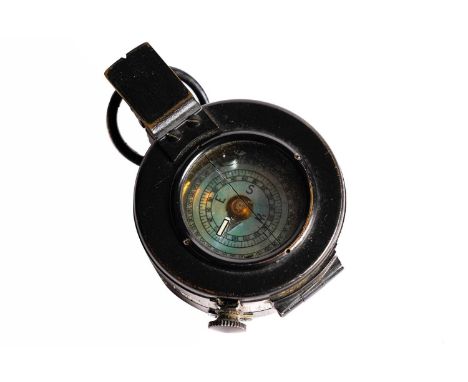 A WWII British military issue compass, by T.G. Co Ltd, No.B 260751, MkIII, dated 1943, in canvas case.