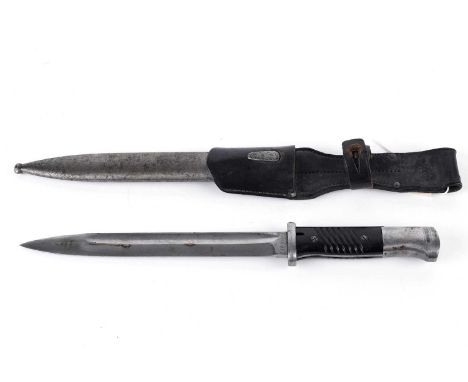 A German K98 bayonet, by Clemen &amp; Jung, 1941, the blade stamped '3407h 41cqn', the scabbard stamped '181D bym4', with lea