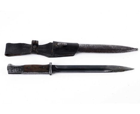 A German K98 bayonet, by Berg &amp; Co, 1944, the blade stamped '2825b 44agv', the scabbard stamped '3257T 43ddl', with leath