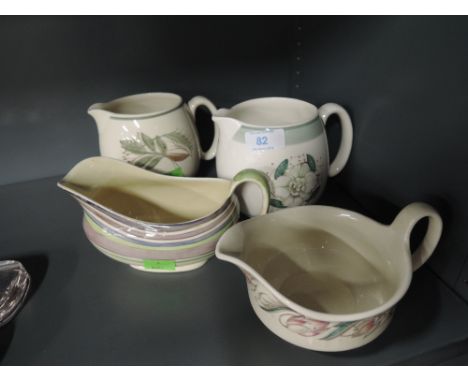 A selection of vintage ceramic jugs some by Susie Cooper 