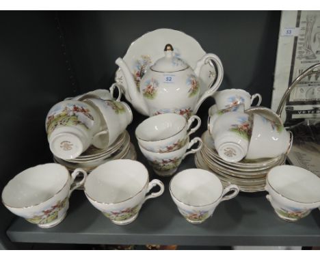 A part tea service by regency bone china with horse racing motiff