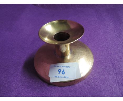 A vintage copper candle stick by the Keswick school of art stamped D378