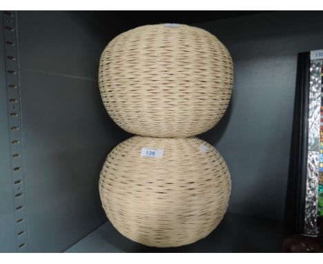A pair of cane work light shades