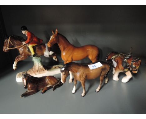 A selection of vintage ceramic figures and figurines horse themes