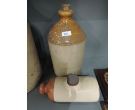 A salt glazed stoneware flagon and ceramic bed warmer