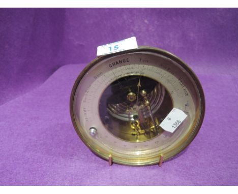 A vintage brass wall mounted Holosteric Barometer