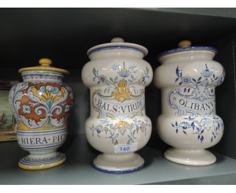 Three ceramic apothecary jars 