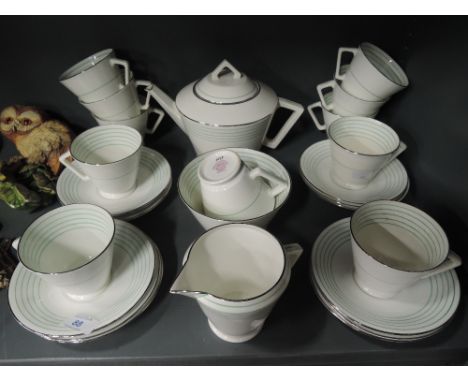 A part tea service by Aladdin China in an art deco design