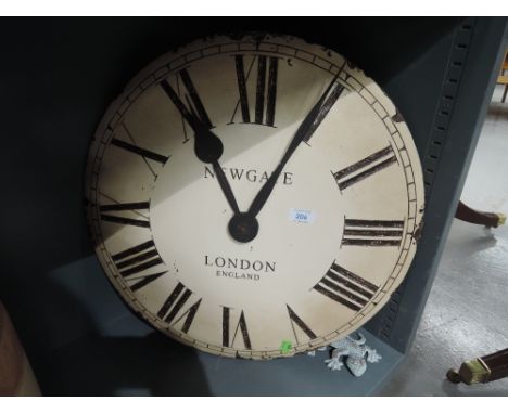 An enamel clock face marked Newgate London