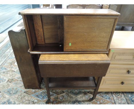 An early 20th Century tea trolley and cabinet 