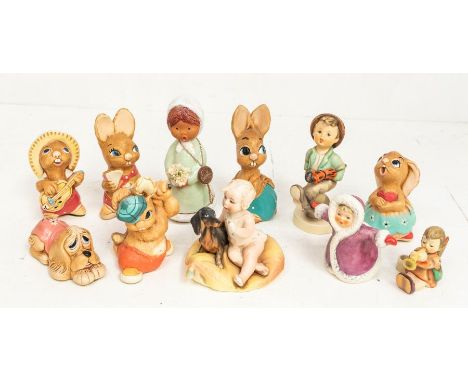 Collection of West German Hummel figures, along with Pendelfin and some other continental figures