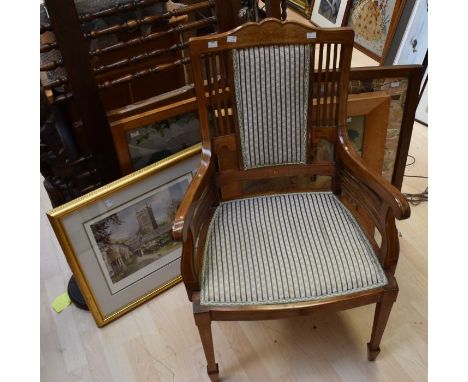 A mahogany Edwardian armchair, two fire screens, reproduction mirror framed tapestry and print