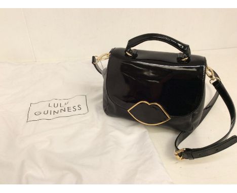 A Lulu Guinness black patent handbag, 2000, with original dust bag, designer name printed on front, attached handle, mimickin