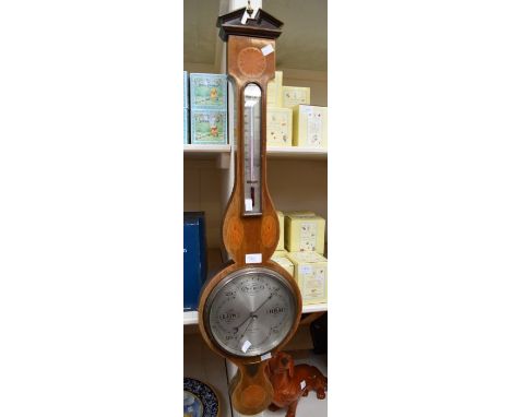 A banjo Sheraton style inlay barometer, with brass presentation plaque dated 1928, mahogany case with barber shop stringing a