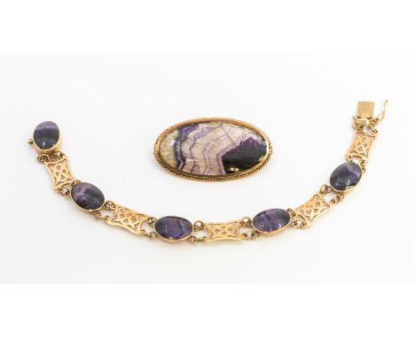 A Blue John and 9ct gold bracelet comprising alternate oval cut Blue John and gold Celtic pierced links, width approx 10mm, l