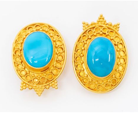 A pair of high carat gold turquoise type enamel earrings, comprising a central oval cabochon turquoise, approx 12 x 18mm, wit