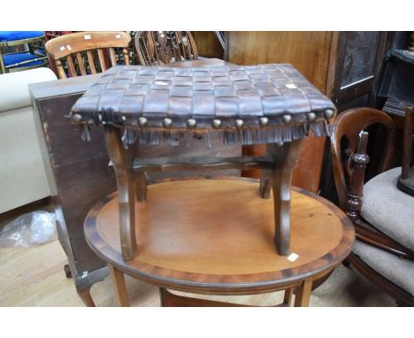 An Edwardian style oval occasional table, a leather topped stool and a wall clock (as found)