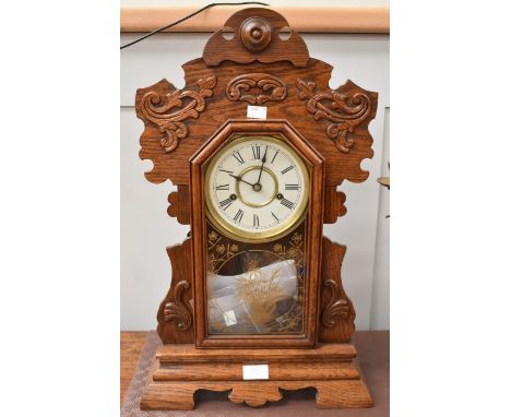 An American mantel / table clock by Jerome &amp; Co, with a&nbsp; two train spring driven movement, chiming on a gong, contai