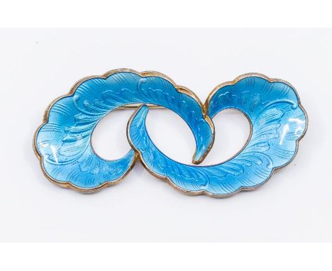  A Norwegian Modernist silver gilt and guilloche enamel brooch, comprising two interlinked blue guilloche feathers, length ap