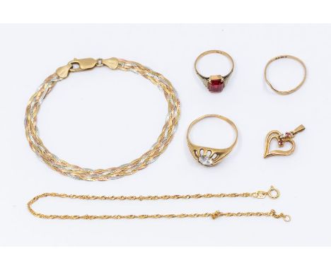 A collection of items to include a 9ct gold cz ring, size T1/2, a along with 9ct gold wishbone ring and paste set ring, toget