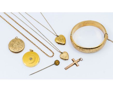 A diamond set 18ct gold circular locket, star set to the centre with an old cut diamond approx 0.10ct, with an engraved with 