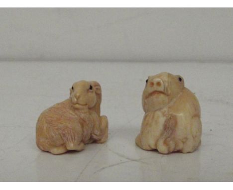 2 bone ojime netsuke, 1 pig and 1 goat