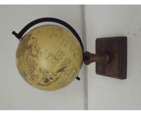 Globe on wooden stand