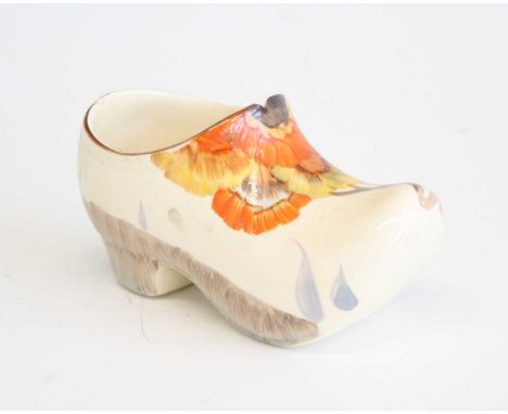 An Art Deco Clarice Cliff Rhodanthe pattern ceramic clog, printed marks to the underside, w.11cm