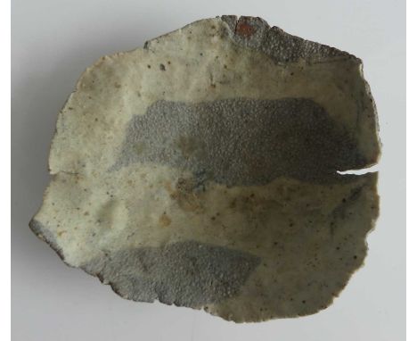 Ewen Henderson (1934-2000) - a studio pottery thinly potted irregular shaped small dish, in two tones of grey, 16.5 x 14cmThe