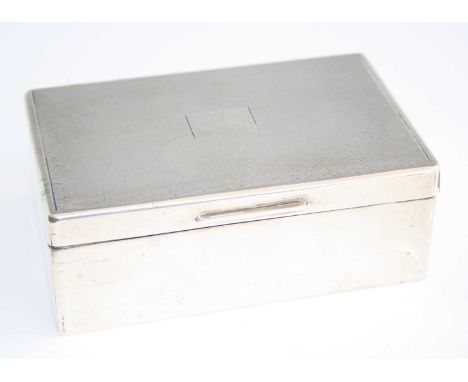 A 1950s silver table cigarette box, the hinged engine turned cover enclosing cedar lined interior, maker S J Rose &amp; Son, 