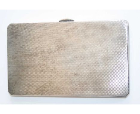 A large late Art Deco silver engine turned pocket cigarette case, having gilt-washed interior and of slightly bowed form, mak