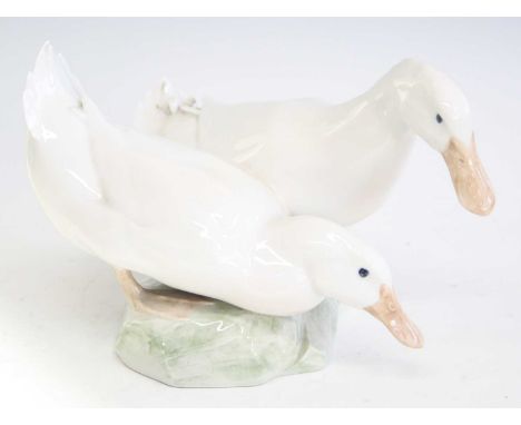 A Royal Copenhagen glazed porcelain model of two ducks, model number 412, printed marks verso, length 30cmApprox. 4x3mm relie