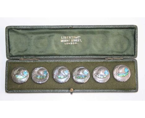 Attributed to Bernard Cuzner for Liberty &amp; Co - a set of six silver and enamel buttons, depicting stylised galleons, hous