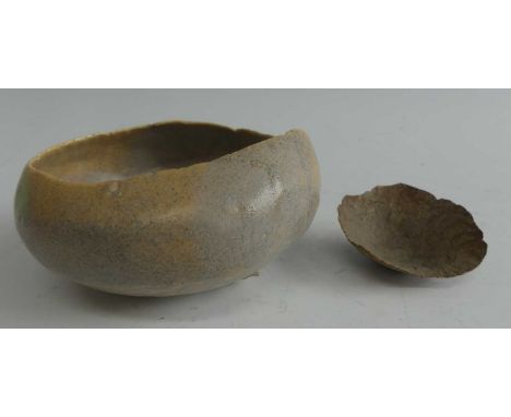 Ewen Henderson (1934-2000) - a studio pottery thinly potted incurved squat pinch pot, in tones of pale blue, dia.12.5cm; toge