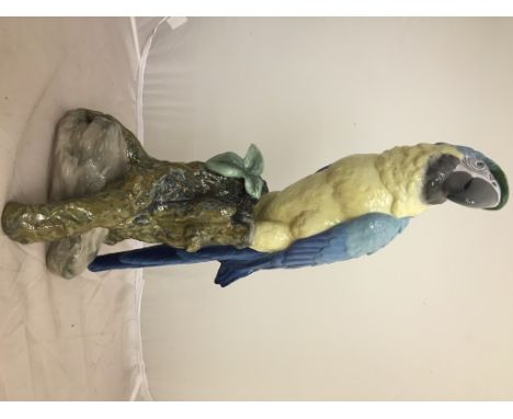 A large Lladro figure of a Macaw: H45cm