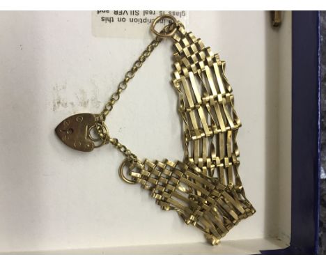 A 9ct gold 7 bar gate bracelet