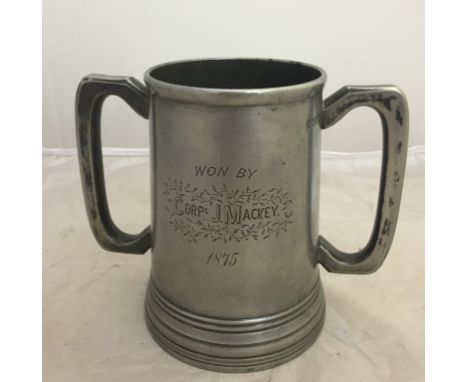 A Military presentation cup, the pewter cup engraved 'The Penton Club Awarded to Cpl J Mackey 1875 for the highest score in t