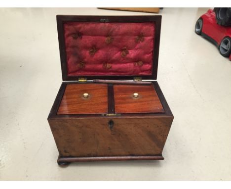 A 19th century mahogany tea caddy and workbox