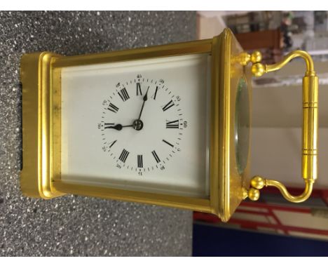 A 19th century French carriage clock, striking on gong