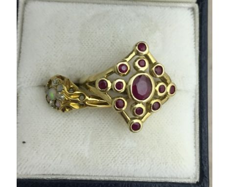 A 9ct ruby dress ring; together with one other