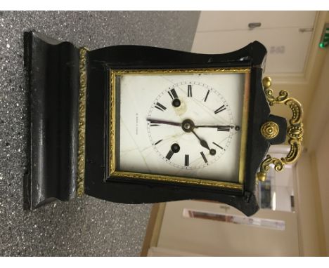 A 19th century French wood-cased alarm clock striking on bell