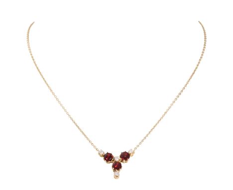 Collier mit 3 hellroten rund facettierten Granaten und 4 Brillanten zus. ca. 0,4 ct, ca. WEISS (H)/SI, GG 14K, 5,5 g, bewegli