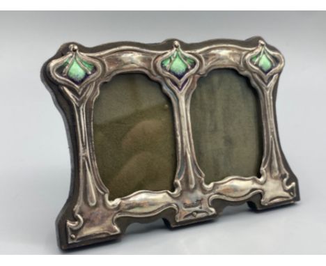 A silver and enamel Tiffany style easel back double picture frame
