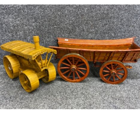 A large Matchstick model of a steam roller together with a handmade wooden model horse cart